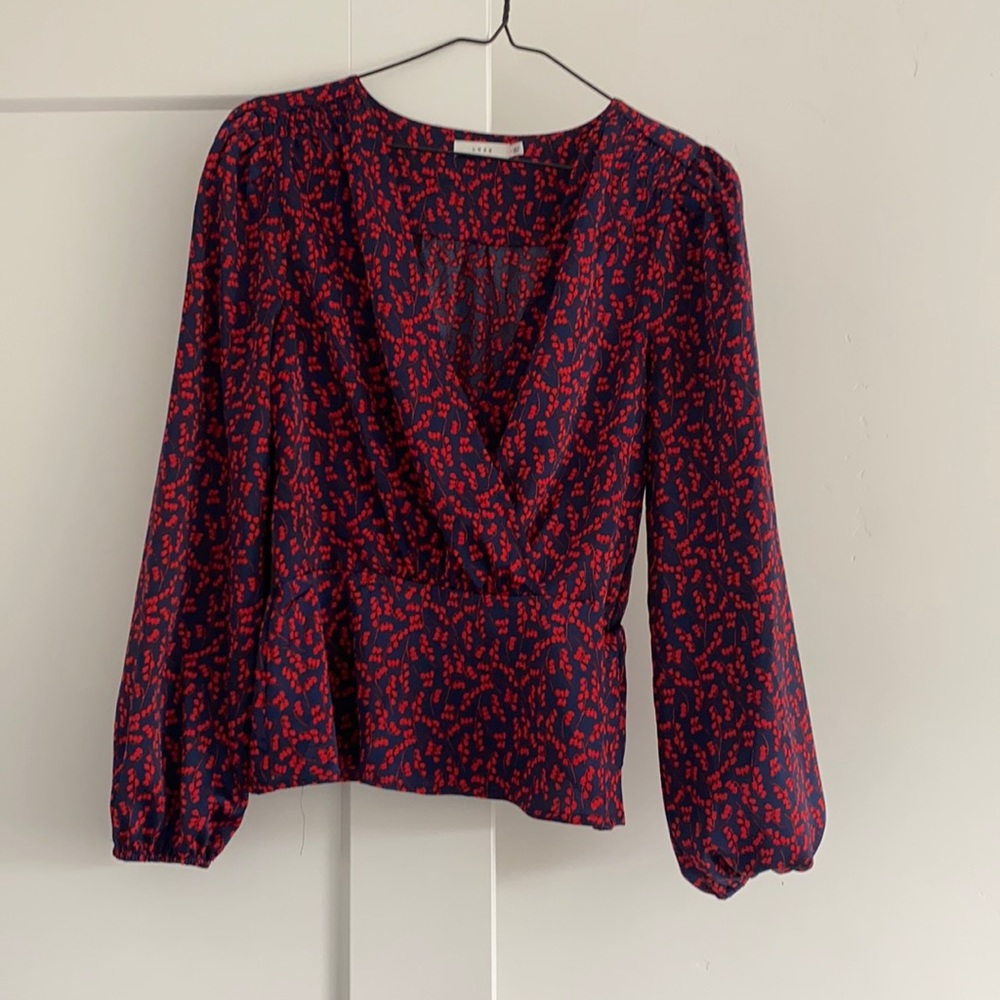 Lush peplum blouse with red floral print